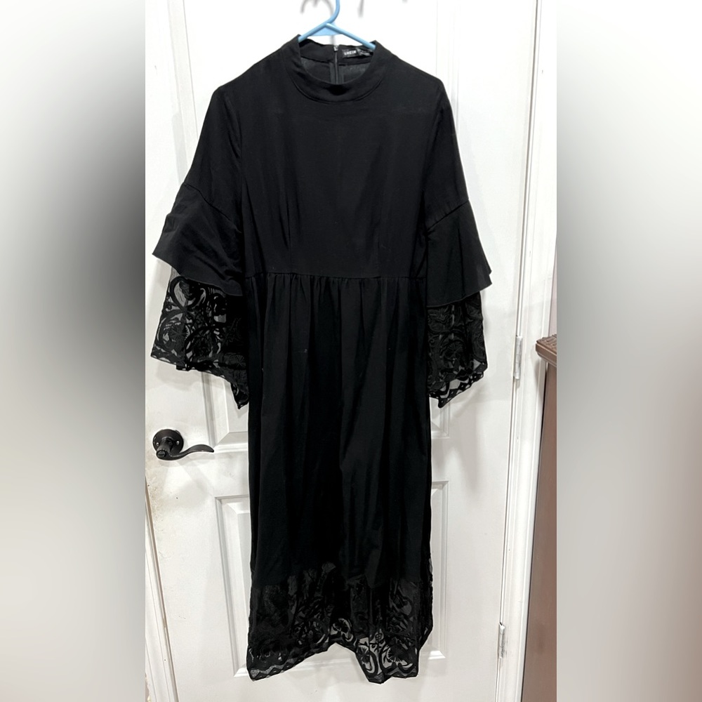 Black elegant dress with laced ruffle on the bottom and sleeves—$20+$8 shipping